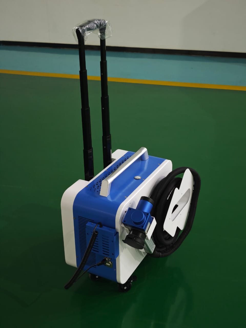 SDQY 300W portable laser cleaner with wheels.
